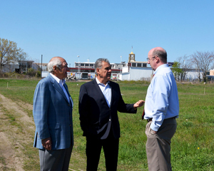 From left, developers Arthur Pappathanasi and Louis Minicucci Jr., talk to James Cowdell about their plans for the former Beacon Chevrolet site.