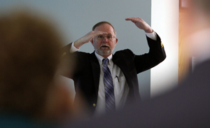 Craig Seymour from RKG Associates answers questions at the Lynn Business Partnership meeting