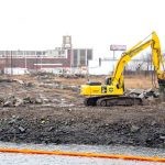 Escavator on redevelopment site.
