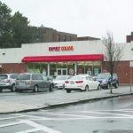 Facade of the Family Dollar store and parking lot that is for sale.