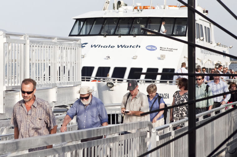 picture of commuters disembarking lynn ferry