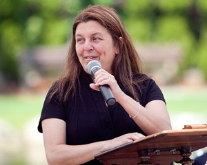 Headshot of Lynn's Mayor, Judith Kennedy standing at a podium speaking